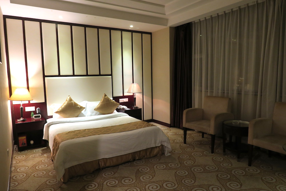 中国南方航空トランジットホテル・広州精益大酒店の寝室の写真